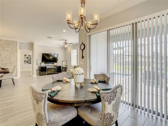 Chandelier, Dining room, Interior, Living room, Recessed Lighting, Stone Walls, Wood Texture Flooring