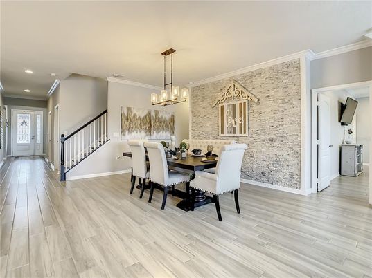 Chandelier, Dining room, Interior, Pendant Lights, Recessed Lighting, Stone Walls, Wood Texture Flooring