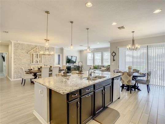 Chandelier, Dining room, Interior, Kitchen, Pendant Lights, Recessed Lighting, Stone Walls, Wood Texture Flooring