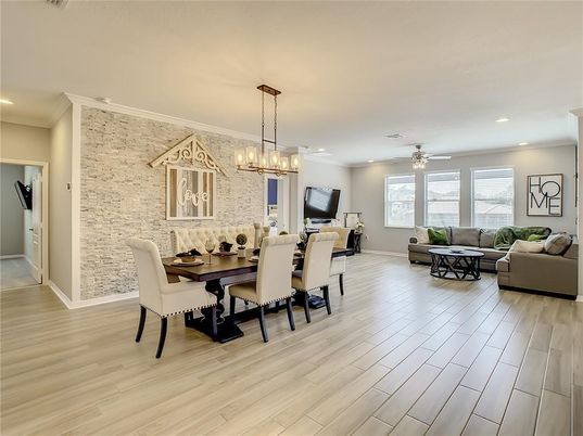 Dining room, Interior, Living room, Pendant Lights, Recessed Lighting, Stone Walls, Wood Texture Flooring