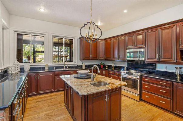 Interior, Kitchen, Pendant Lights, Recessed Lighting, Stainless Steel Appliances, Wood Texture Flooring