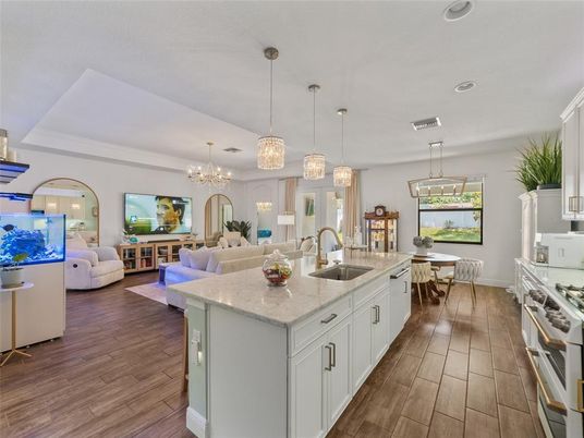 Chandelier, Dining room, Interior, Kitchen, Living room, Pendant Lights, Recessed Lighting, Wood Texture Flooring