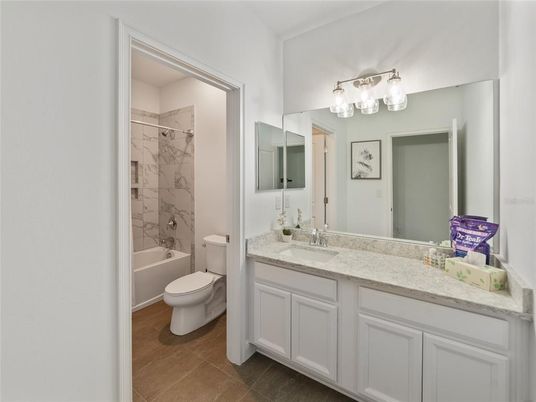 Bathroom, Dual Sink Vanities, Interior, Marble Walls, Wood Texture Flooring