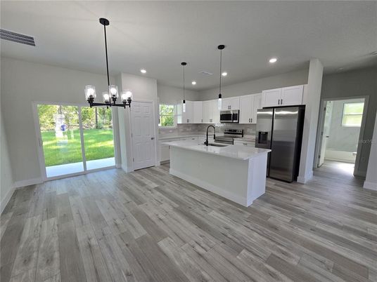 Interior, Kitchen, Pendant Lights, Recessed Lighting, Stainless Steel Appliances, Wood Texture Flooring