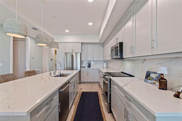 Interior, Kitchen, Pendant Lights, Recessed Lighting, Stainless Steel Appliances, Wood Texture Flooring