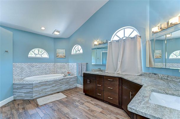 Bathroom, Dual Sink Vanities, Interior, Recessed Lighting, Wood Texture Flooring