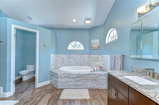 Bathroom, Dual Sink Vanities, Interior, Recessed Lighting, Wood Texture Flooring