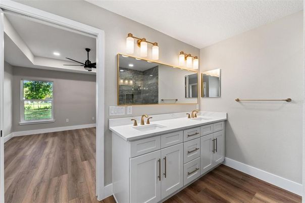 Bathroom, Dual Sink Vanities, Interior, Recessed Lighting, Wood Texture Flooring