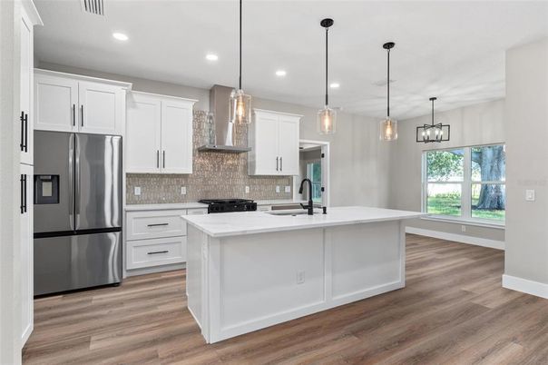 Interior, Kitchen, Pendant Lights, Recessed Lighting, Stainless Steel Appliances, Wood Texture Flooring