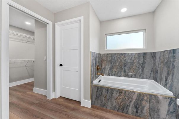 Bathroom, Interior, Recessed Lighting, Walk-in Closets, Wood Texture Flooring