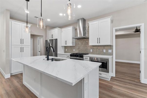 Interior, Kitchen, Pendant Lights, Recessed Lighting, Stainless Steel Appliances, Wood Texture Flooring