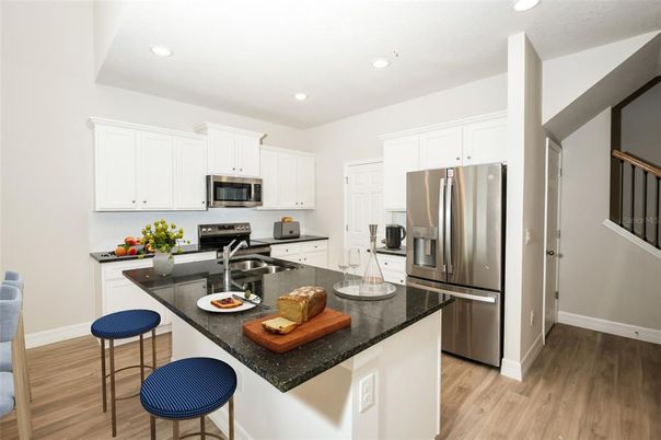 Interior, Kitchen, Recessed Lighting, Stainless Steel Appliances, Wood Texture Flooring