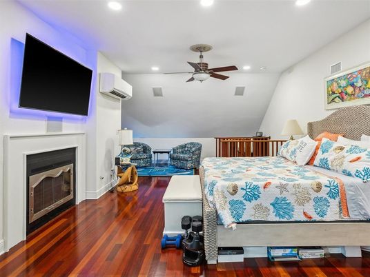 Bedroom, Fireplace, Interior, Recessed Lighting, Wood Texture Flooring