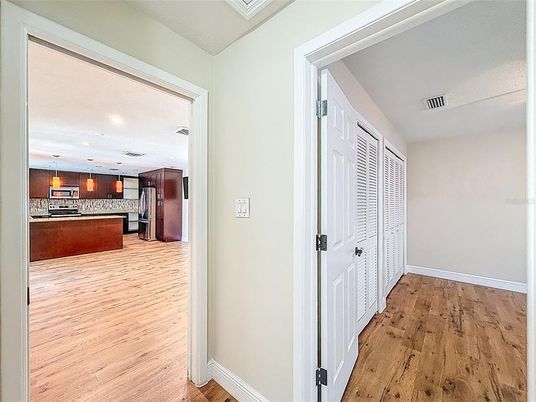 Interior, Kitchen, Pendant Lights, Recessed Lighting, Stainless Steel Appliances, Wood Texture Flooring