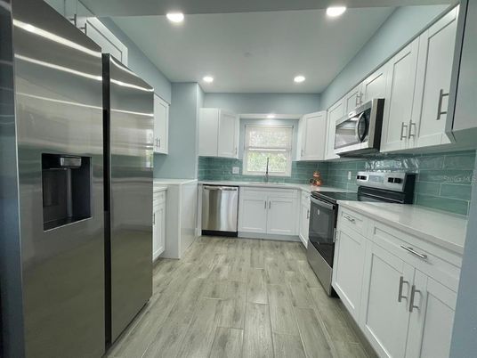 Interior, Kitchen, Recessed Lighting, Stainless Steel Appliances, Wood Texture Flooring