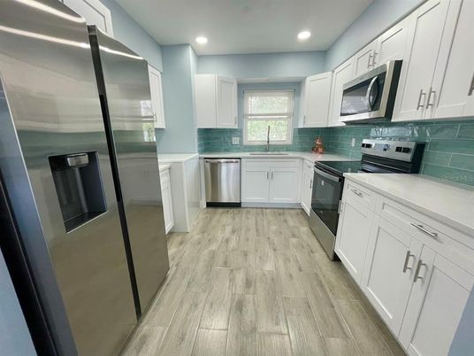 Interior, Kitchen, Recessed Lighting, Stainless Steel Appliances, Wood Texture Flooring