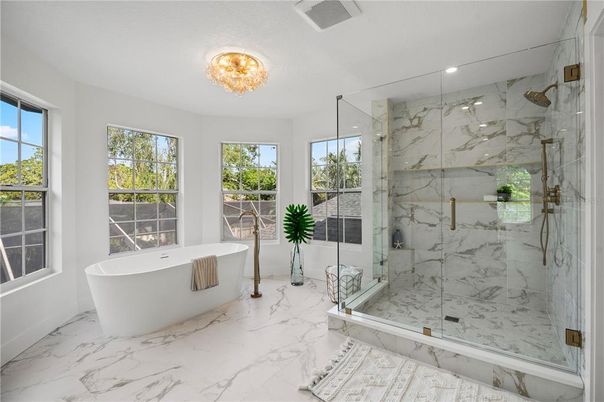 Bathroom, Free Standing Baths, Glass Shower, Interior, Marble, Marble Walls, Recessed Lighting