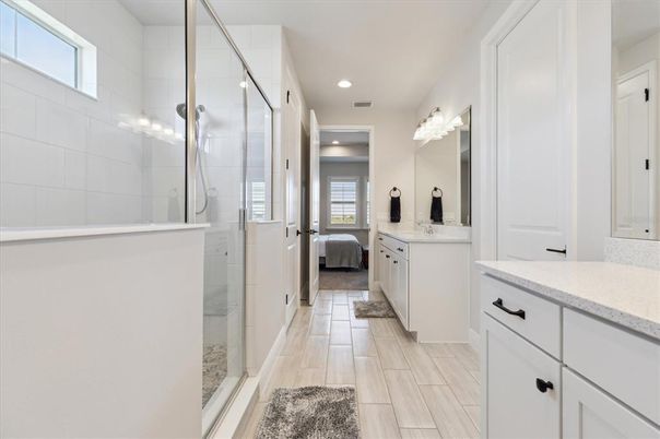 Bathroom, Bedroom, Glass Shower, Interior, Recessed Lighting, Wood Texture Flooring
