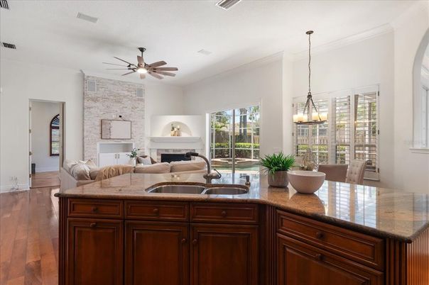 Dining room, Fireplace, Interior, Living room, Pendant Lights, Stone Walls, Wood Texture Flooring