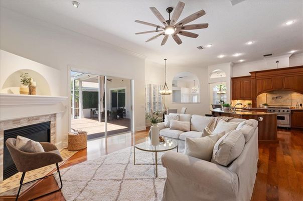 Dining room, Fireplace, Interior, Kitchen, Living room, Pendant Lights, Recessed Lighting, Stainless Steel Appliances, Wood Texture Flooring