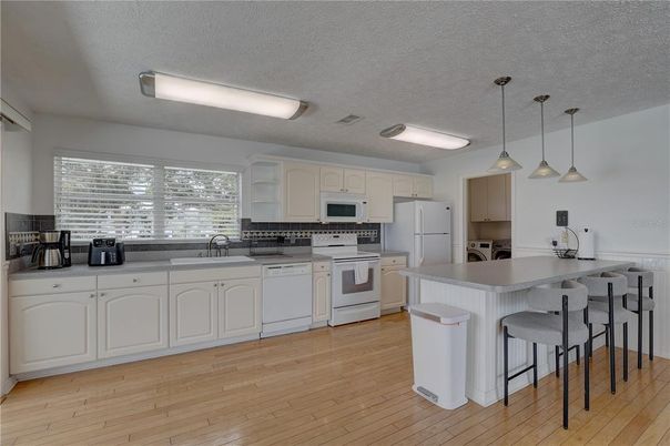 Interior, Kitchen, Pendant Lights, Stainless Steel Appliances, Wood Texture Flooring