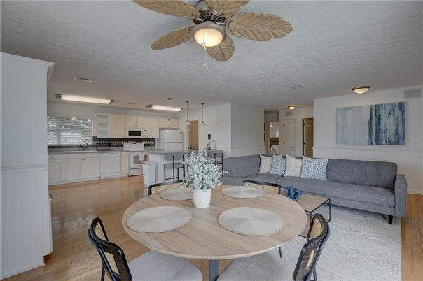 Dining room, Interior, Kitchen, Living room, Pendant Lights, Stainless Steel Appliances, Wood Texture Flooring