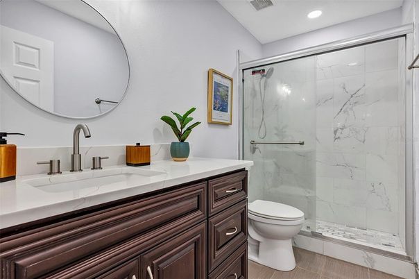Bathroom, Glass Shower, Interior, Marble Walls, Recessed Lighting, Wood Texture Flooring