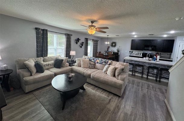 Dining room, Interior, Kitchen, Living room, Pendant Lights, Recessed Lighting, Stainless Steel Appliances, Wood Texture Flooring