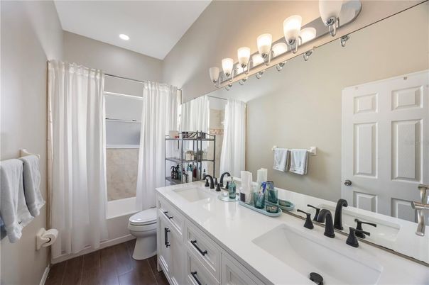 Bathroom, Dual Sink Vanities, Interior, Recessed Lighting, Wood Texture Flooring
