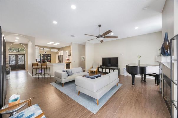 Dining room, Interior, Kitchen, Living room, Piano, Recessed Lighting, Wood Texture Flooring