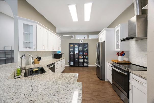 Interior, Kitchen, Recessed Lighting, Stainless Steel Appliances, Wood Texture Flooring