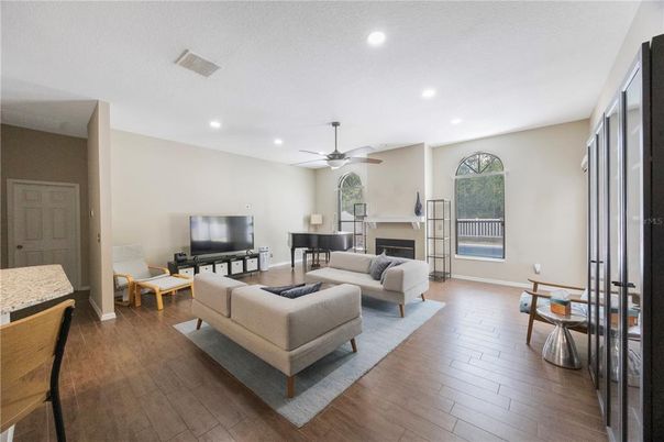 Fireplace, Interior, Living room, Recessed Lighting, Wood Texture Flooring