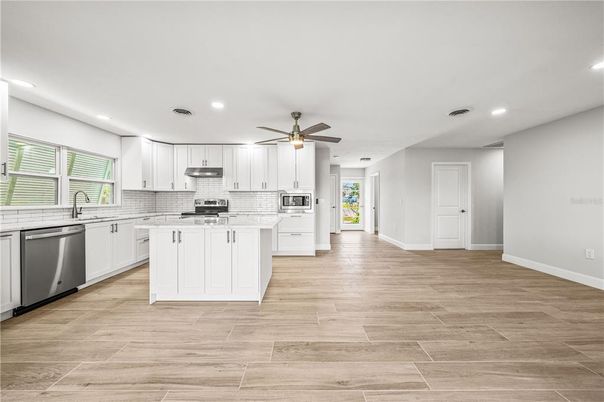 Interior, Kitchen, Recessed Lighting, Stainless Steel Appliances, Wood Texture Flooring