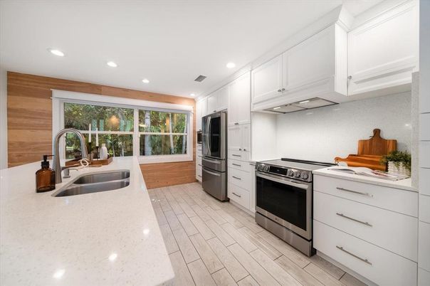 Interior, Kitchen, Recessed Lighting, Stainless Steel Appliances, Wood Texture Flooring