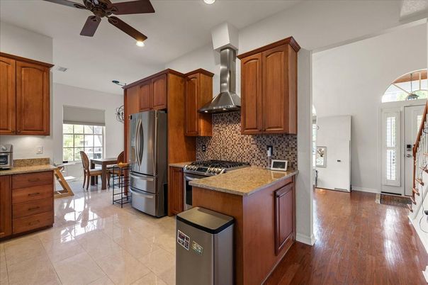 Dining room, Interior, Kitchen, Recessed Lighting, Stainless Steel Appliances, Wood Texture Flooring