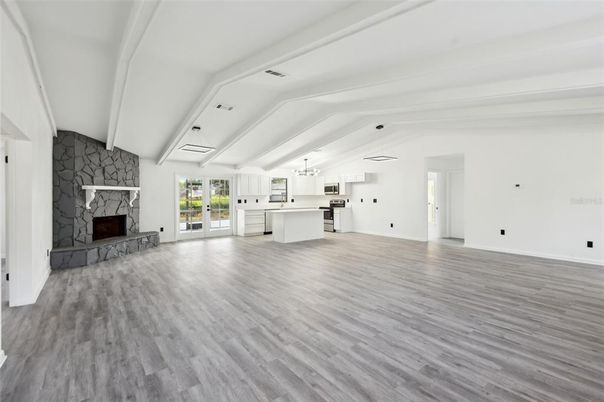 Empty room, Fireplace, Interior, Kitchen, Pendant Lights, Wood Texture Flooring