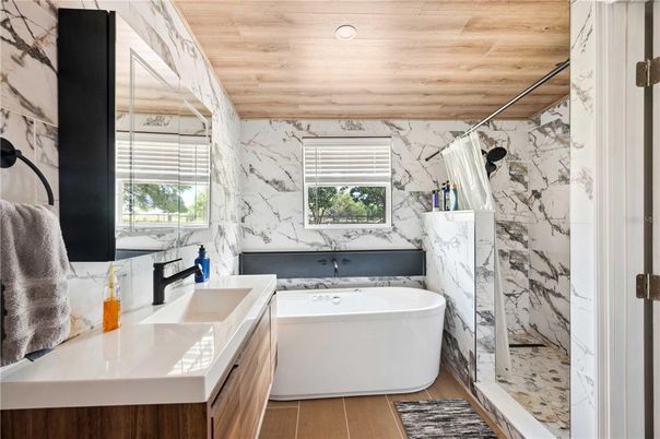 Bathroom, Dual Sink Vanities, Free Standing Baths, Interior, Marble Walls, Wooden Ceilings, Wood Texture Flooring