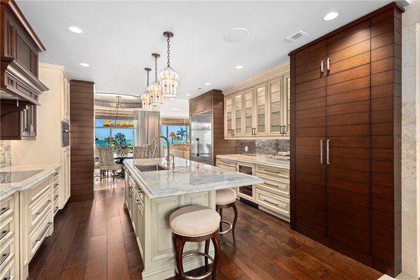 Chandelier, Interior, Kitchen, Pendant Lights, Recessed Lighting, Stainless Steel Appliances, Wood Texture Flooring