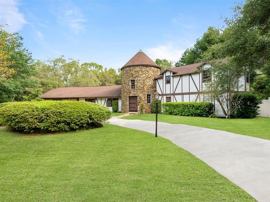 Attached, Backyard, Exterior, Facade, Brick Facade, Tudor Revival