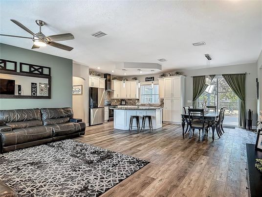 Dining room, Interior, Kitchen, Living room, Pendant Lights, Recessed Lighting, Stainless Steel Appliances, Wood Texture Flooring