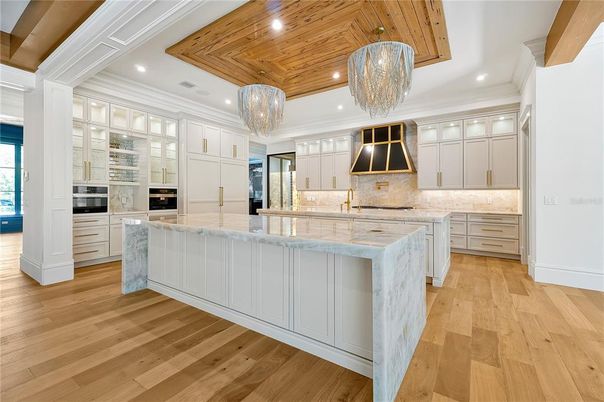 Chandelier, Interior, Kitchen, Pendant Lights, Recessed Lighting, Stainless Steel Appliances, Wooden Ceilings, Wood Texture Flooring