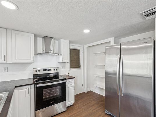 Interior, Kitchen, Recessed Lighting, Stainless Steel Appliances, Wood Texture Flooring