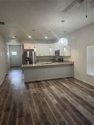 Interior, Kitchen, Pendant Lights, Recessed Lighting, Stainless Steel Appliances, Wood Texture Flooring