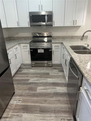 Interior, Kitchen, Stainless Steel Appliances, Wood Texture Flooring