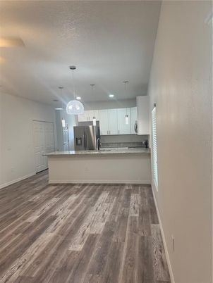 Interior, Kitchen, Pendant Lights, Stainless Steel Appliances, Wood Texture Flooring