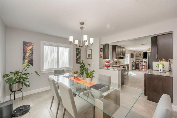 Chandelier, Dining room, Interior, Kitchen, Pendant Lights, Recessed Lighting, Stainless Steel Appliances