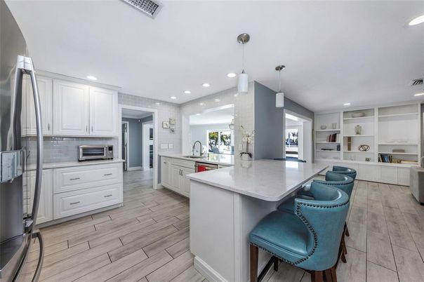 Interior, Kitchen, Pendant Lights, Recessed Lighting, Stainless Steel Appliances, Wood Texture Flooring