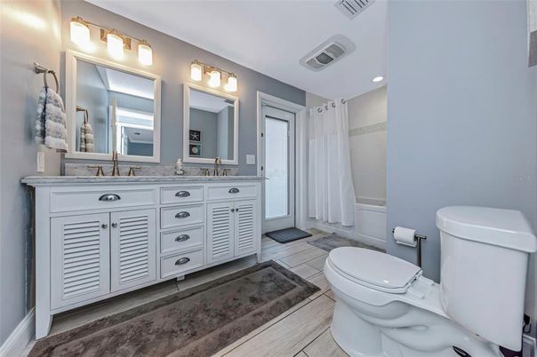 Bathroom, Dual Sink Vanities, Interior, Recessed Lighting, Wood Texture Flooring