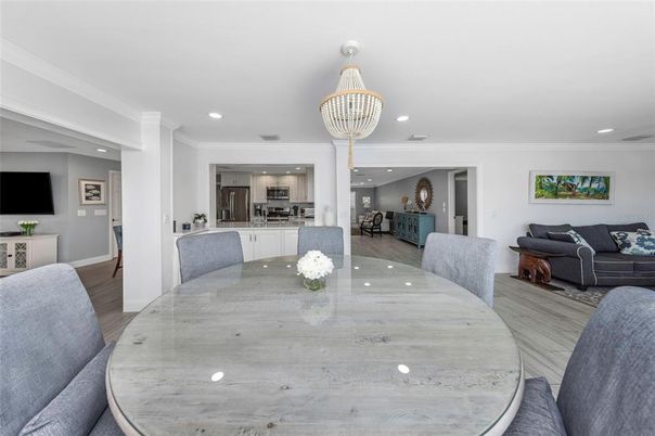 Chandelier, Dining room, Interior, Kitchen, Living room, Pendant Lights, Recessed Lighting, Wood Texture Flooring