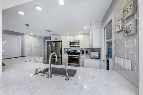 Interior, Kitchen, Marble, Pendant Lights, Recessed Lighting, Stainless Steel Appliances